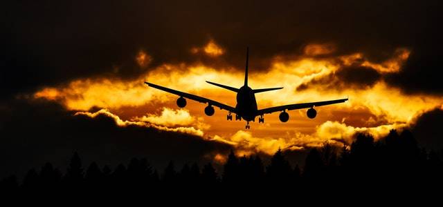 Plane into Sunset